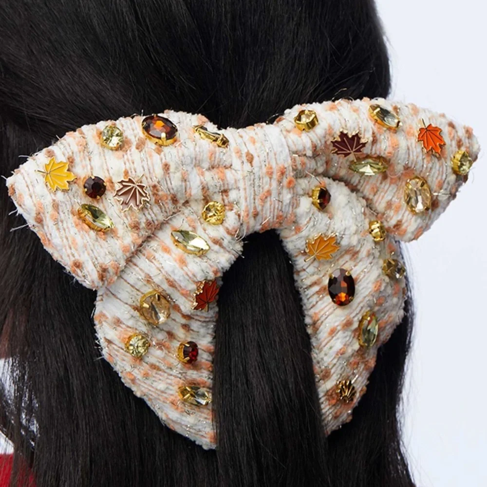 LELE SADOUGHI AUTUMN BOUCLE FALLING LEAVES CRYSTAL BOW BARRETTE